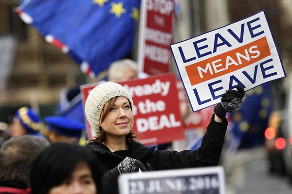 Protesters outside Houses of Parliament ahead of statement by British Prime Minister Theresa May on Brexit